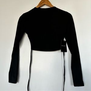 Solado Solid Tie Backless Curved Hem Crop Top